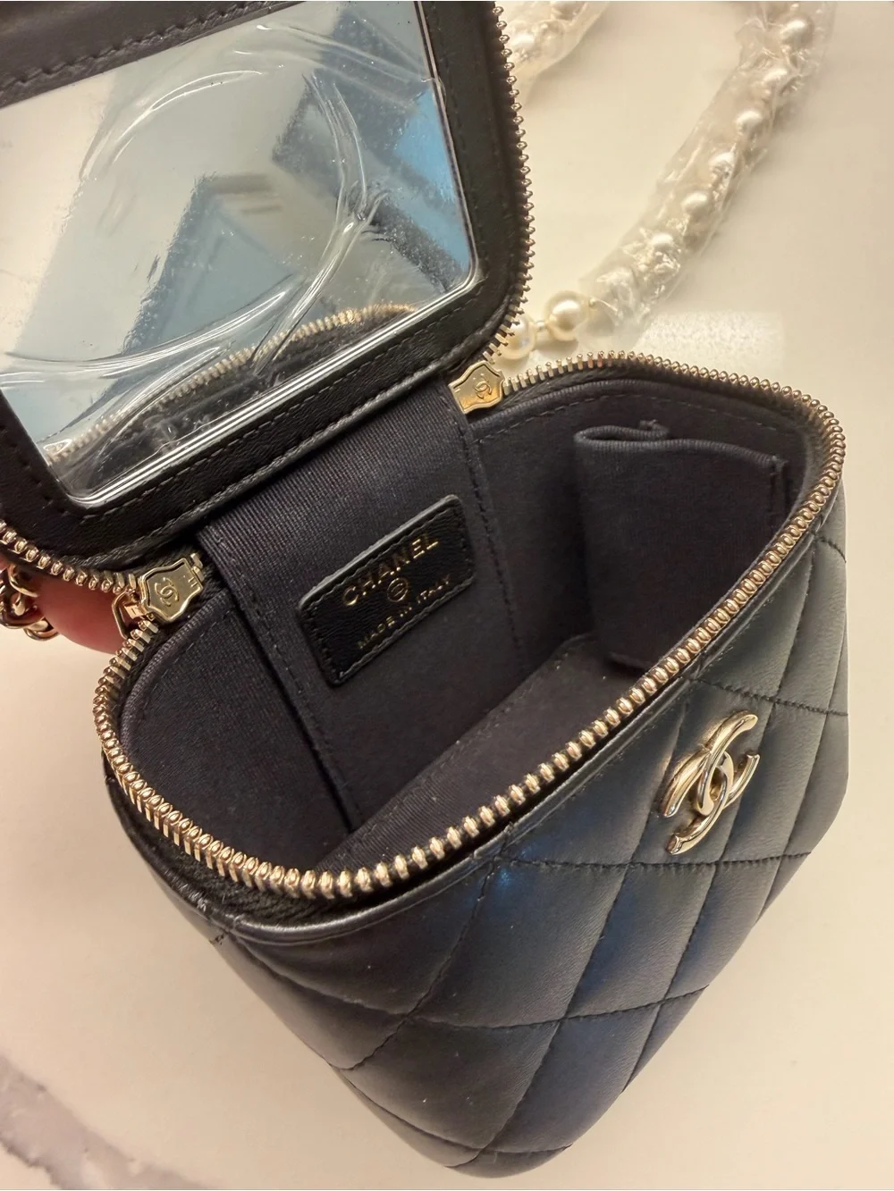 CHANEL Black Quilted Vanity Mini Bag with Pearl Strap